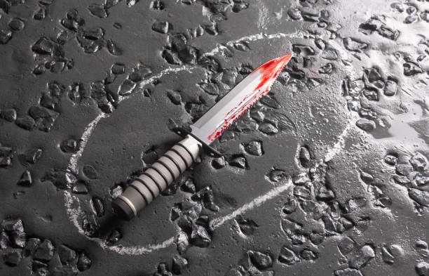 zombie knife with blood, outlined with chalk